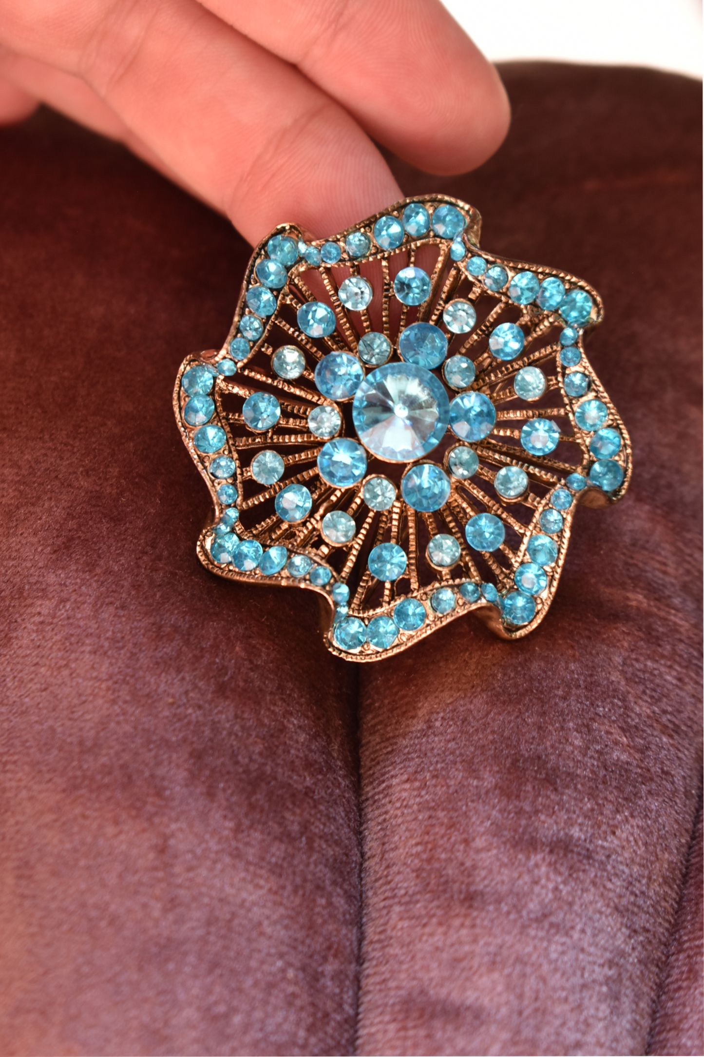 Broche blauw